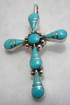 Turquoise Sterling Silver Cross Pendant From New Mexico Stamped "sterling" " B F" Measures 2" L 1 1/8" W Collectible Turquoise Sterling Silver Necklace, Spiritual Turquoise Jewelry Stamped 925, Spiritual Hallmarked Turquoise Jewelry, Spiritual Turquoise Jewelry With Hallmark, Southwestern Style Blue Hallmarked Jewelry, Southwestern Style Turquoise Jewelry In Sterling Silver, Southwestern Turquoise Sterling Silver Jewelry, Turquoise Inlay Sterling Silver Jewelry, Southwestern Style Turquoise Sterling Silver Jewelry