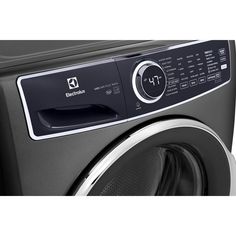 the front load washer is shown with its door open and it's button on