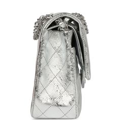 This Medium Classic Double Flap Bag is in metallic silver aged calfskin leather with silver tone hardware featuring, signature diamond quilt, front flap with CC turnlock closure, half moon back pocket and an adjustable interwoven silver tone chain link and metallic silver leather shoulder/crossbody strap.The interior is lined in metallic silver leather with the "love letter" zipper compartment underneath the first flap, an "outer" slit pocket under the second flap, and an interior compartment with two open pockets separated by a "lipstick" compartment.Collection: 12-Series (2008-2009)Origin: FranceCondition: Never worn - no signs of wearAccompanied by: Chanel Box, Chanel dustbag, felt, carebook, COA cardMeasurements: 10" width x 6" height x 2.75" depth; 16.5" strap drop (9.5" doubled) Chanel Box, Louis Vuitton Shop, Silver Age, Birkin 25, Diamond Quilt, Flap Bag, Half Moon, Crossbody Strap, Silver Hardware