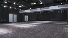 an empty room with chairs and lights