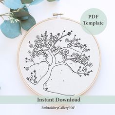 an embroidery pattern with the words instant printable on it and a tree in bloom