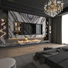 a bedroom with a fireplace in the middle and a chandelier hanging from the ceiling