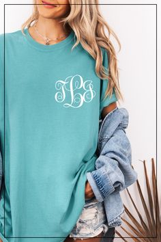 "Add a touch of personalized style to your wardrobe with this elegant monogram tee. Perfect for casual days out or layering up with your favorite jacket. Make it uniquely yours or gift it to someone special! 🌿💎 #MonogramTee #PersonalizedFashion #ChicStyle #CustomApparel #TrendyTops #GiftIdeas #FashionEssentials" White Monogram Crew Neck T-shirt, Blue Monogram Cotton Tops, Monogrammed Short Sleeve Cotton T-shirt, White Monogram T-shirt With Crew Neck, Casual Cotton Monogram T-shirt, Short Sleeve Cotton Monogram Top, Short Sleeve Cotton Tops With Monogram, Short Sleeve Cotton Top With Monogram, Monogram Shirt