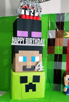 a birthday cake made to look like a minecraft creeper