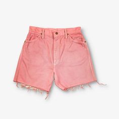 "Gender:Womens  Vintage Wrangler cut off denim shorts in overdyed pink with zip fly. Fit size W28. Made from cotton.  Condition:Excellent  Shorts have been overdyed. Colour may transfer. Please rinse thoroughly.  Measurements:     Waist: 28\"   Leg Length: 4\"" Spring Washed Pink Bottoms, Spring Pink Washed Bottoms, High Rise Pink Shorts With Frayed Hem, High Waist Pink Jean Shorts With Frayed Hem, Pink High Waist Jean Shorts With Frayed Hem, Pink High-waist Jean Shorts With Frayed Hem, Pink Cutoff Jean Shorts With Frayed Hem, Vintage Pink Cotton Shorts, Shorts Rosa