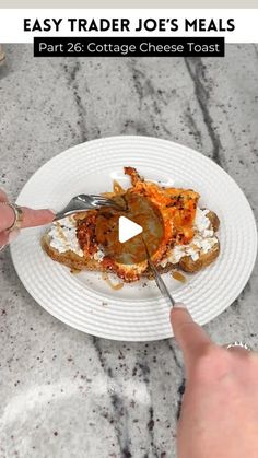 a person is cutting into a piece of food on a white plate with the title easy trader joe's meals part 26 cottage cheese toast