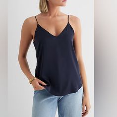 Express: Timeless Double Layer V-Neck Cami In A Beautiful Soft Satin Fabric. Featuring Adjustable Spaghetti Straps And A Rounded Hem In A Deep Navy Blue. The Perfect Staple Piece To Add To Your Wardrobe For An Effortless Chic Look For Any Occasion. (Size: Xl) *Nwt* Trendy V-neck Camisole For Day Out, Chic Blue V-neck Top For Summer, Elegant Blue V-neck Tank Top, Chic V-neck Camisole For Day Out, Versatile V-neck Tank Top, Elegant V-neck Camisole For Workwear, Blue V-neck Tank Top For Work, V-neck Camisole For Work, V-neck Camisole For Spring Workwear