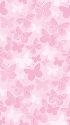 a pink background with many butterflies on it