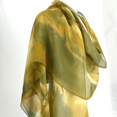 If you love green. . . This lovely green scarf has lots of green color variation with golds, yellows and browns. Dyed first with metal, this scarf was then painted with color. Wide enough and long enough to be a shawl, this piece offers lots of options. Lightweight and can be worn year round. Approximately 20" x 90" Dry Clean Only Shawl Outfit, Wearable Art Fashion, Silk Chiffon Scarves, Green Scarf, Green Hand, Dyed Silk, Art Green, Silk Shawl, Hand Dyed Silk