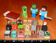 a wooden table topped with lots of different types of blocks and toys on top of it