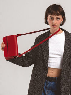 Elevate your style with our Leather Shoulder Bag in bold Red. Crafted for the fashion-forward individual, this bag seamlessly blends modern design with everyday functionality. Red Bag With Detachable Handle For Fall, Red Satchel Box Bag For Office, Red Top Handle Shoulder Bag For Fall, Fall Red Bag With Detachable Handle, Versatile Red Rectangular Shoulder Bag, Trendy Workwear Bags With Adjustable Handle, Red Shoulder Box Bag For Office, Red Square Box Bag For Office, Red Leather Satchel With Adjustable Handle