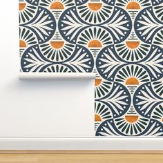 an abstract wallpaper design with orange and blue circles on it, against a white wall