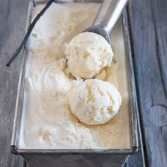 two scoops of ice cream in a metal container