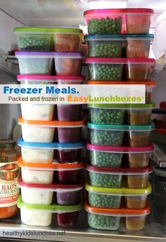 freezer meals packed and frozen in easy lunchboxes are stacked on top of each other