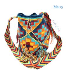 Colorful & unique crochet bag! Very lightweight, durable and comfortable to carry on. Wear it as a cross-body or shoulder bag. This stunning boho style bag is perfect for a casual day, as a beach/pool accessory or as a complement to your sports outfit. Details: Medium Size Bucket Bag Style Desert Sunset Colors (Yellow, Orange, Navy, Burgundy) Traditional indigenous symbology pattern. Matching hand-woven strap with zig-zag pattern Drawstring closure with tassels Material: Made from cotton threads Fall Color Combinations, Bucket Bag Style, Boho Style Bag, Sports Outfit, Desert Sunset, Beautiful Color Combinations, Sunset Colors, Pattern Matching, Pool Accessories