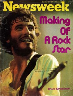 a magazine cover with a man playing a guitar and smiling at the camera as if he was making a rock star