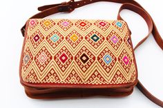 Beautiful embroidered Mexican Purses. It's one of a kind design and very versatile to use it every day. It's a great complement to wear with any outfits for any special occasion or everyday use. This lovely purse is embroidered on the front and the backside is plain. The Purse has 1 zippered compartment on top and a magnetic snap with a crossbody adjustable strap. It measures about 10x2x8″ inches. Find more colors and designs at https://www.etsy.com/shop/LatinxsCulturaViva?ref=simple-shop-header Embroidered Satchel Shoulder Bag, Brown Embroidered Satchel For Travel, Brown Embroidered Satchel For Daily Use, Daily Use Embroidered Brown Satchel, Brown Embroidered Shoulder Bag, Daily Use Brown Embroidered Satchel, Multicolor Embroidered Satchel Shoulder Bag, Embroidered Brown Rectangular Satchel, Embroidered Brown Bag As Gift