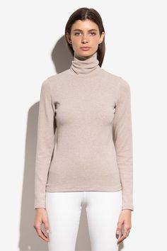 Another classic staple with an extra long neck. Fold over for a classic look or leave long for a chic transformation - and of course, warmth. In our ultra-soft cotton baby rib, this turtleneck is sure to be your favorite go-to layering piece! Cotton, Spandex Pullover styling Machine wash Imported Sustainably made from deadstock fabric Fashion Family, Long Neck, Fine Fabric, Cotton Baby, Contemporary Fashion, Fold Over, Layering Pieces, Easy Wear, Of Course