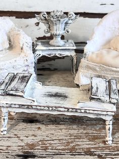 an old chair and footstool are sitting next to each other