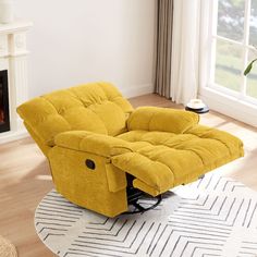 a yellow reclining chair sitting on top of a rug