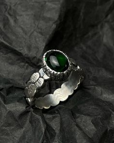 Discover elegance with our 925 sterling silver emerald ring, a stunning handmade piece featuring a vibrant green gemstone. This exquisite statement ring is adorned with delicate diamond accents, adding a touch of sparkle to its bold design. Perfect as a unique birthday gift or a cherished addition to your jewelry collection, this green stone ring combines timeless beauty with modern charm. Each ring is meticulously crafted to ensure it stands out with sophistication and grace. MATERIAL:  Sterlin May Birthstone Jewelry With Stone Setting, Unique Green Birthstone Jewelry, Emerald Jewelry With Stone Setting For Gift, Fine Jewelry Emerald Ring In Sterling Silver, Green Oval Jewelry With Bezel Setting, Unique Jewelry With May Birthstone In Round Shape, Green Jewelry With Stone Setting, Unique Round Jewelry For May Birthstone, White Gold Ring With May Birthstone