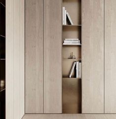 an empty book shelf in the corner of a room