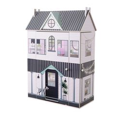 a paper doll house with a bicycle parked outside