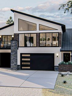 this is an artist's rendering of a modern house with two car garages