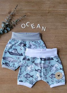 Ocean evolving shorts Materials: Organic cotton lycra jersey. Size: 3-12 months Price: $13 Shipping $3 by regular delivery with Canada Post. If you would like to pick it up in Saint-Hippolyte in the Laurentians, please contact me before making the transaction. p.s Please note that some clothes have labels and others do not because we have stopped using them in order to offer you the best possible price. Homemade creation entirely made with love! Marilyne & Danielle Abily creations https://www.fa Playful Stretch Shorts For Playtime, Stretch Cotton Shorts For Playtime, Fitted Shorts For Playtime, Fitted Shorts With Elastic Waistband For Playwear, Playful Stretch Cotton Shorts, Gender Neutral Baby Clothes, Canada Post, Clothing Sets, Gender Neutral Baby