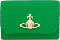 Vivienne Westwood.Green Saffiano Business Card Holder.Saffiano faux-leather card holder in green..· Card slot at face.· Logo hardware at press-stud flap.· Fully lined.· H3' x W4.25' x D1'.Supplier color: Bright green.58% recycled polyurethane, 42% polyurethane..Made in Italy..241314M163067 Designer Green Wallets With Interior Card Slots, Designer Green Wallet With Interior Card Slots, Green Designer Wallets With Interior Card Slots, Green Luxury Card Holder With Interior Slots, Green Leather Luxury Card Holder, Luxury Green Leather Card Holder, Elegant Green Bifold Card Holder, Elegant Green Formal Card Holder, Luxury Green Wallets With Card Slots