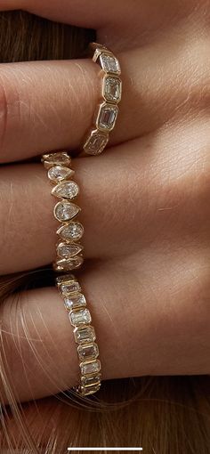 Sparkle with sophistication! Our 14K Yellow Gold Bezel Set Emerald Cut Diamond Eternity Band is the ultimate statement piece for a night out or any day, adding a touch of glamour to every occasion. 1.14 CT 2.70 Grams Alternating Pear Wedding Band, Bezel Wedding Band With Engagement Ring, Unique Diamond Bands, Unique Wedding Stack Rings, Pear Eternity Band, Ring Stacks Wedding, Pear Engagement Ring Stack, Pear Shaped Wedding Set, Diamond Statement Rings