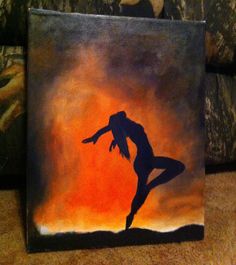 a painting of a man doing yoga in front of an orange sky