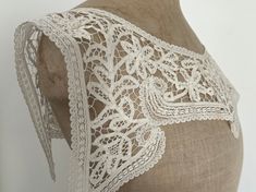 A beautiful antique lace collar made by hand in the early 1900s. This would have been made as a collar or a lace insert for a dress. It is gorgeous as either. The style of lace is known as Battenberg, a technique introduced during the Victorian era. Size :  Depth at centre front : 4 1/2" Depth at centre back: 2" Width across shoulders : 16" The collar has no fastenings at the back and I have pinned it together as you can see in the photo. I am happy to add fastenings if you let me know when purc Lace Collar Dress, Battenberg Lace, Bib Collar, Antique Lace, Lace Insert, Lace Collar, Early 1900s, Collar Dress, Victorian Era