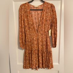 Altar’d State Dress Is Nwt. Long Sleeve V-Neck With 3 Clasps. It Is Light Weight So Would Be Good For Warm And Cool Months. Smoke Free Home. Flowy V-neck Mini Dress For Fall, Fall Daywear Dress With Surplice Neckline, Fall V-neck Lined Mini Dress, Flowy V-neck Mini Dress For Daywear, V-neck Dress With Floral Print, Orange Long Sleeve Dress, Altard State Dresses, Orange Long Sleeve, Altard State