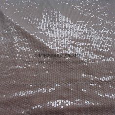 Price: The price is for 1yard.1 yard=130cm wide*91cm length if you buy more than 1 yard,it wont be cut. in one piece the longest is 15 yards. we also make wholesale,it starts 15 yards.if you want wholesale contact me. Material: sequins,Polyester Fixed Wide : 130cm or 51 inches. color:Off white Use for This product is applied to children dress, women and other garment decoration, wedding decoration, hotel decoration, decorative dried flowers, festive decoration, hair accessories, loss, home texti White Sequin Fabric For Summer, Elegant Cream Sequin Fabric For Party, Glamorous Summer Wedding Sequin Fabric, Cream Sequin Fabric For Party, Embellished Cream Sequin Fabric For Party, Cream Embellished Sequin Fabric For Party, Cream Embroidered Sequin Fabric For Party, White Sequin Fabric For Wedding And Party Season, Silver Sequin Fabric For Wedding And Party Season