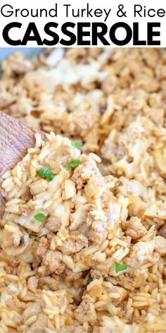 ground turkey and rice casserole in a pan with a wooden spoon on top