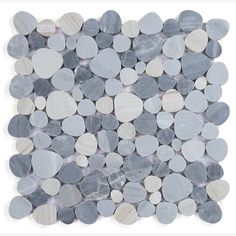 grey and white pebbles are arranged in a square pattern