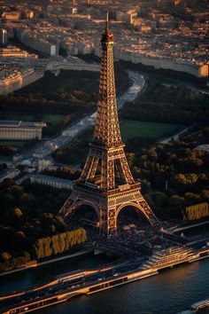 an aerial view of the eiffel tower in paris, france at sunset time