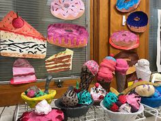 there are many different types of doughnuts on the shelves in front of the door