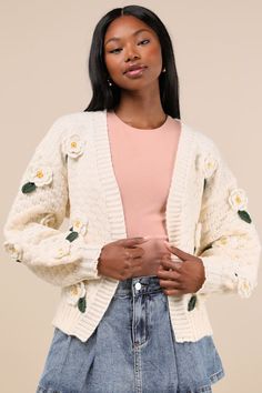 We know that the Lulus Chosen Charm Cream Knit Embroidered Cardigan Sweater will always be your first pick when it comes to showing off your style! Cozy, heavy-gauge knit shapes this eye-catching cardigan sweater that features three-dimensional, crocheted floral embroidery throughout. Long balloon sleeves (with drop shoulders and fitted cuffs) frame a wide-cut, open-front bodice. Ribbed knit accents the neckline, cuffs, and hem. Fit: This garment fits true to size. Length: Size medium measures 2 Casual Cream Cardigan With Floral Embroidery, Cozy Long Sleeve Sweater With Floral Embroidery, Casual Embroidered Knit Cardigan, Casual Embroidered Knit Outerwear, Cozy Winter Sweater With Floral Embroidery, Spring Cable Knit Cardigan, White Embroidered Knit Cardigan, Embroidered Cream Cardigan For Winter, Cream Embroidered Winter Cardigan