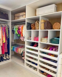 an organized closet with white shelving and lots of shoes