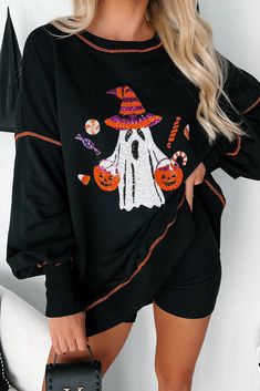 SELF: 85% COTTON, 15% POLYESTER. CONTRAST: 95% COTTON, 5% SPANDEX Model Wearing Size Small Color: Black Round Neckline Orange Seam Long Balloon Sleeves Sequin Halloween Print Oversized Fit High-Low Hem 18.5" Armpit To Sleeve End 17" Armpit To Longest Hem For Model Size Specs Please Check Size Charts Launched: 9/17/24 Spooky Black Long Sleeve Top, Casual Black Halloween Top, Black Long Sleeve Top For Halloween, Long Sleeve Black Top For Halloween, Black Witchy Tops With Letter Print, Black Tops For Halloween Costume Party, Witchy Black Top For Costume Party, Black Witchy Tops For Costume Party, Black Witchy Top For Costume Party