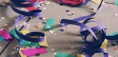 confetti and streamers are scattered on the table