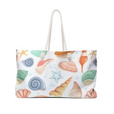 a white bag with seashells and starfish printed on it's side