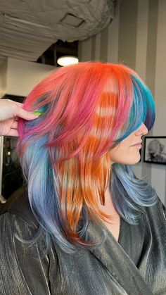 Blue laveder hair with neon orange into neon pink, one section is an orange racoon tail Orange And Blue Hair Ideas, Pink Racoon Tail Hair, Racoon Stripes Hair, Orange And Blue Hair, Blue And Orange Hair, Orange And Pink Hair, Racoon Tail Hair, Pink Yellow Hair, Pink And Blue Highlights