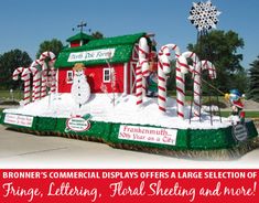 an inflatable christmas display with candy canes and snowmen on it for sale