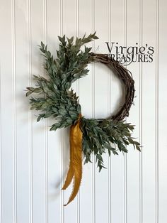 a wreath hanging on the side of a wall