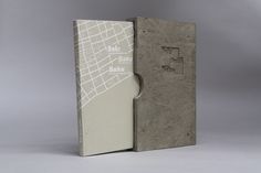 the book is made out of concrete and has a map on it's cover