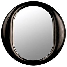 an oval mirror is shown against a white background