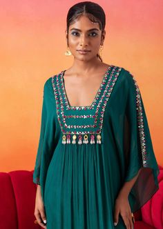 Full length emerald green embellished kaftan with handmade tassels on neckline. Seema Thukral, Green Kaftan, Kaftan For Women, Trendy Outfits Indian, Heavy Dresses, Designer Kurti Patterns, Kurti Patterns, Long Kurti Designs, Kurta Neck Design